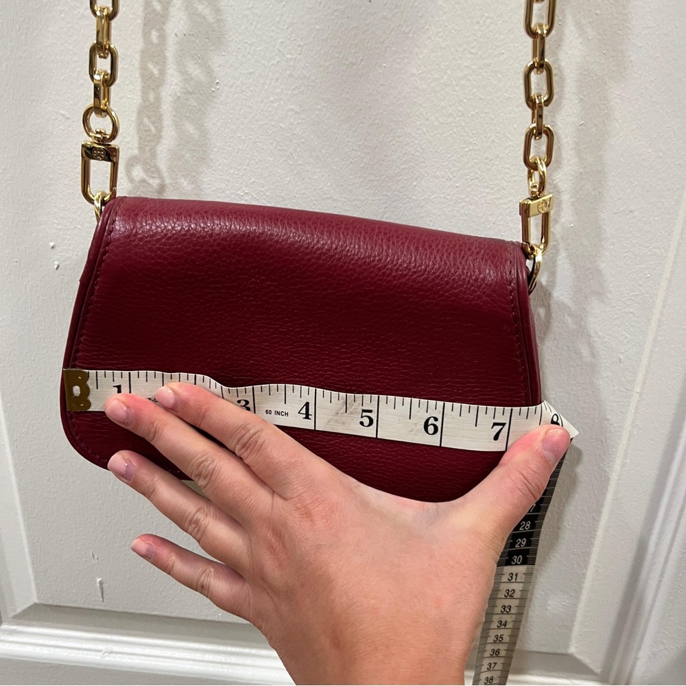 Tory Burch
Tory Burch Burgundy Leather Bitten Clutch Bag - Picture 8 of 9